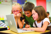 Three kids on laptop